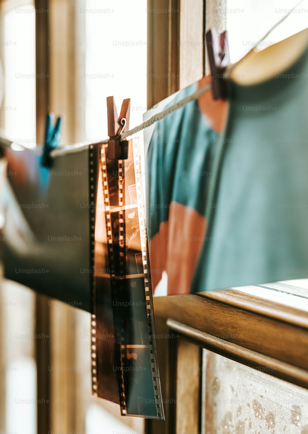 a film strip hanging on a clothes line
