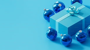 una confezione regalo blu con un fiocco e ornamenti intorno