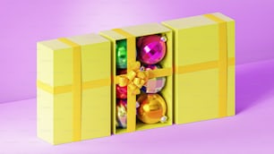 a yellow box with ornaments inside of it