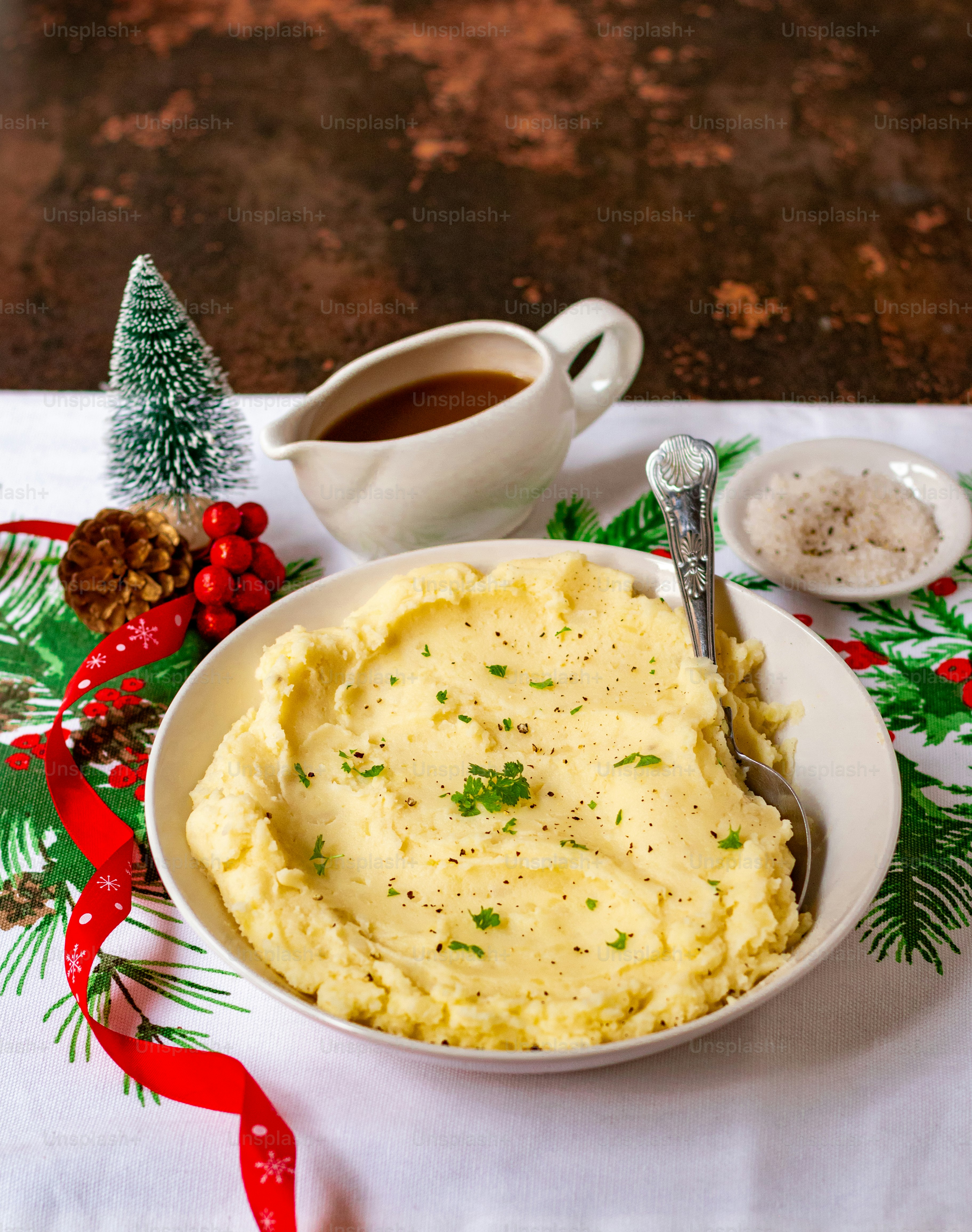 a bowl of mashed potatoes and a cup of coffee