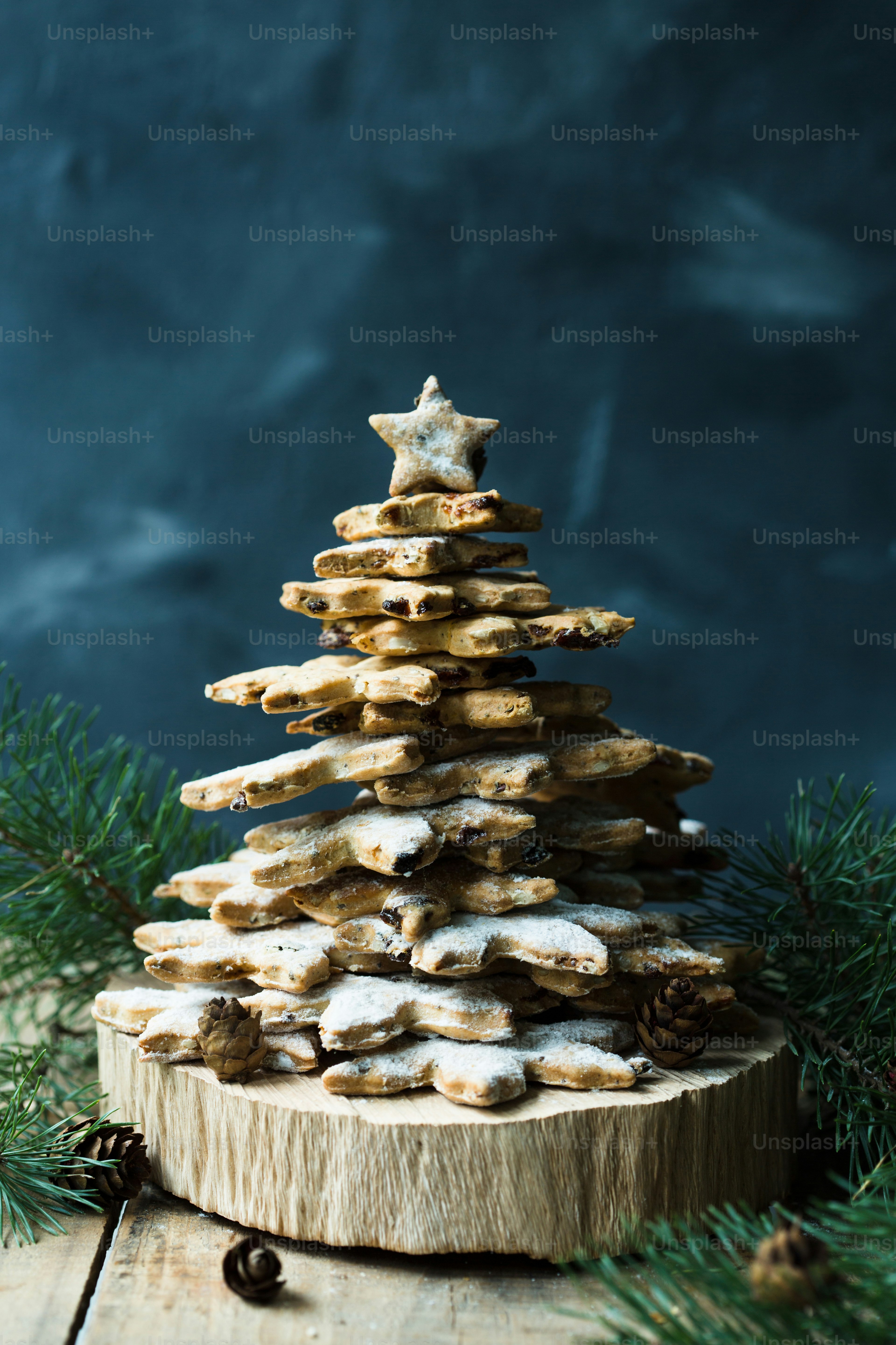 a christmas tree made out of doughnuts on a wooden table