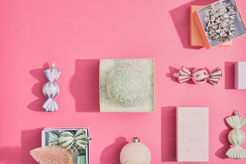 a pink wall with various items on it