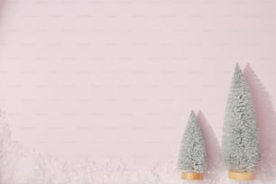 a couple of small trees sitting on top of a table