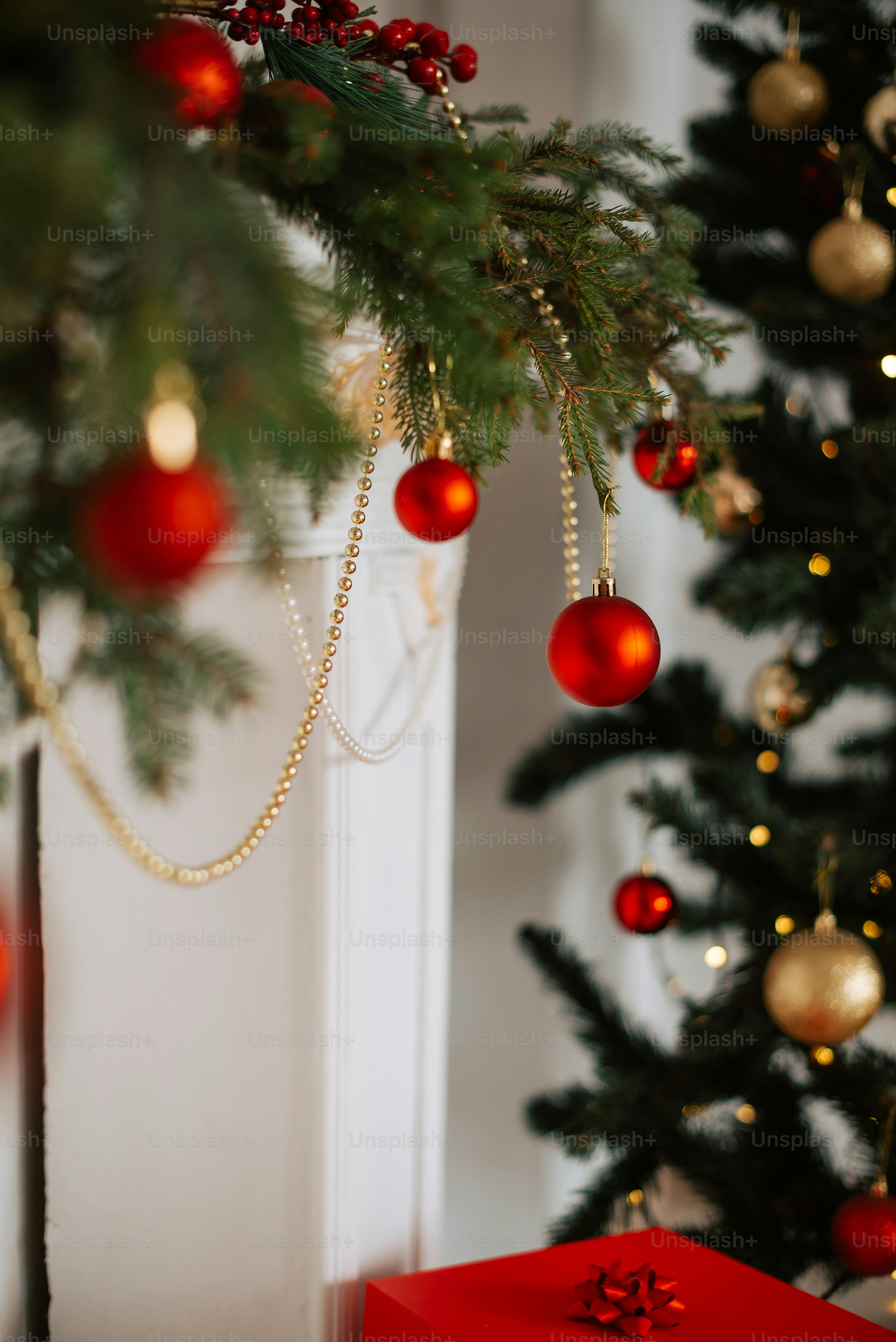 a christmas tree with red and gold ornaments