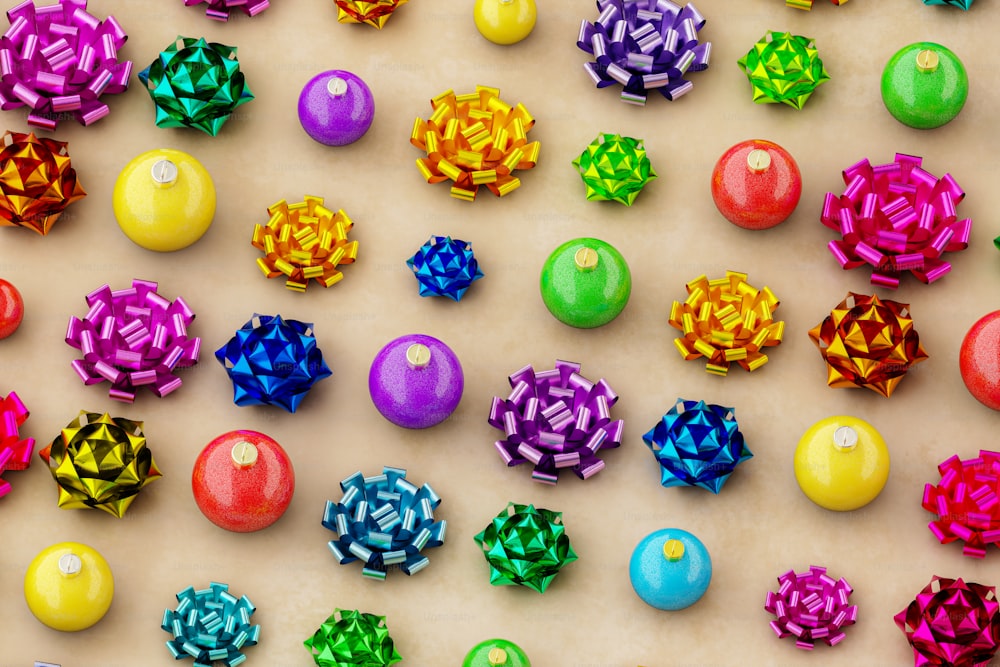 a group of colorful balls and bows on a table