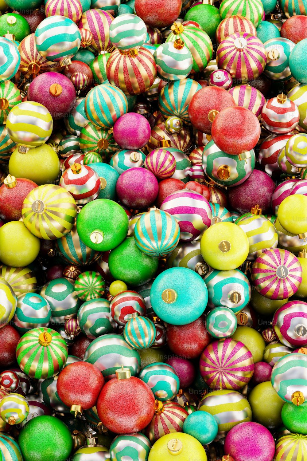 a pile of colorful christmas ornaments sitting on top of each other