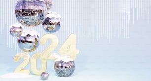 a number of shiny balls and numbers are in front of a blue background