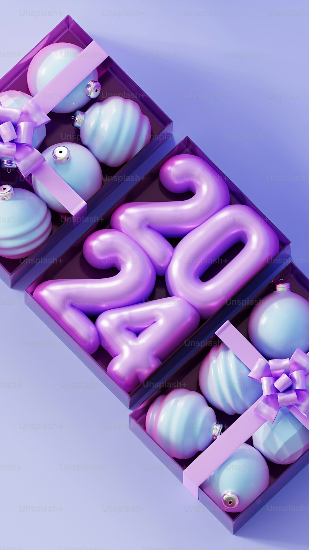 a purple box with balloons and a bow on it
