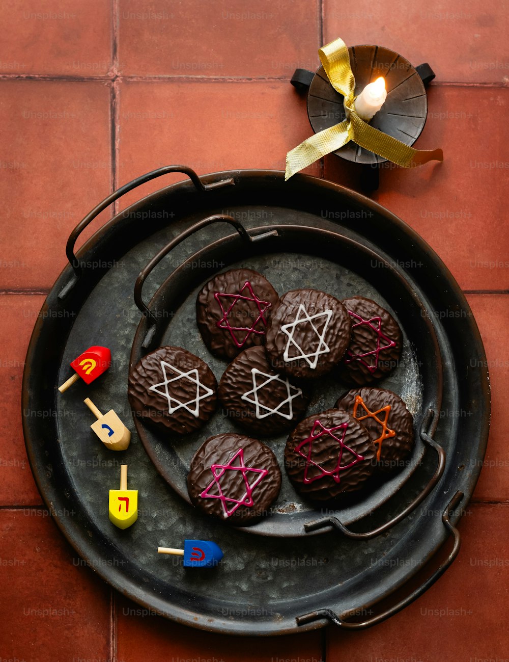 a plate of cookies decorated with star of david
