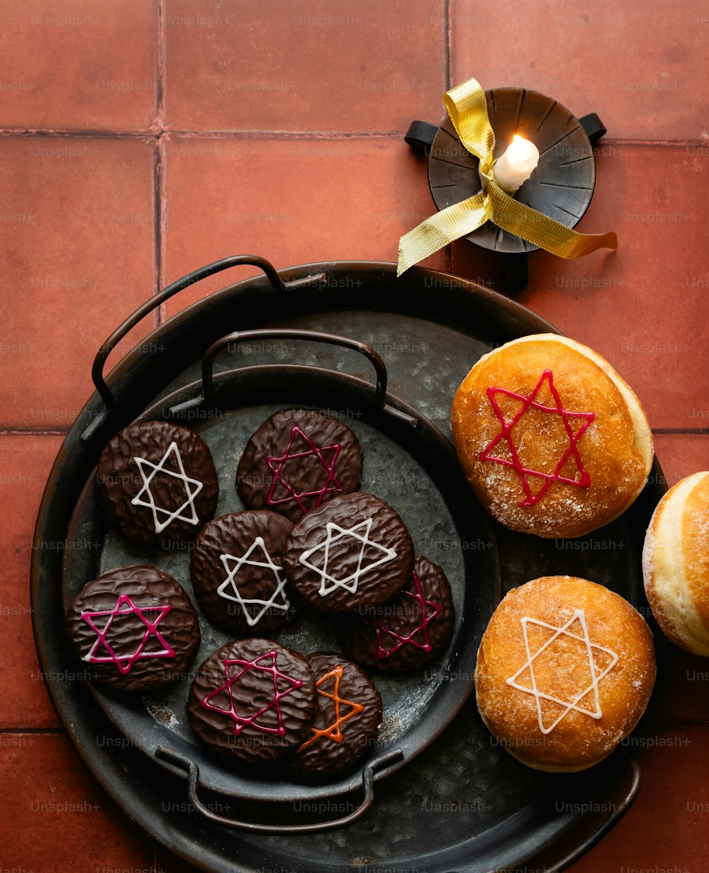 a plate of cookies decorated with a star of david