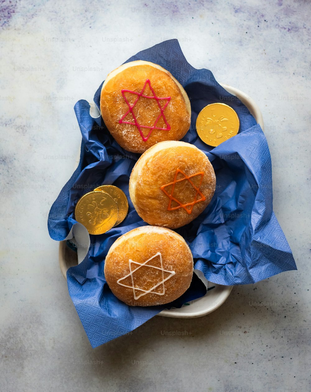 three donuts with a star of david on them