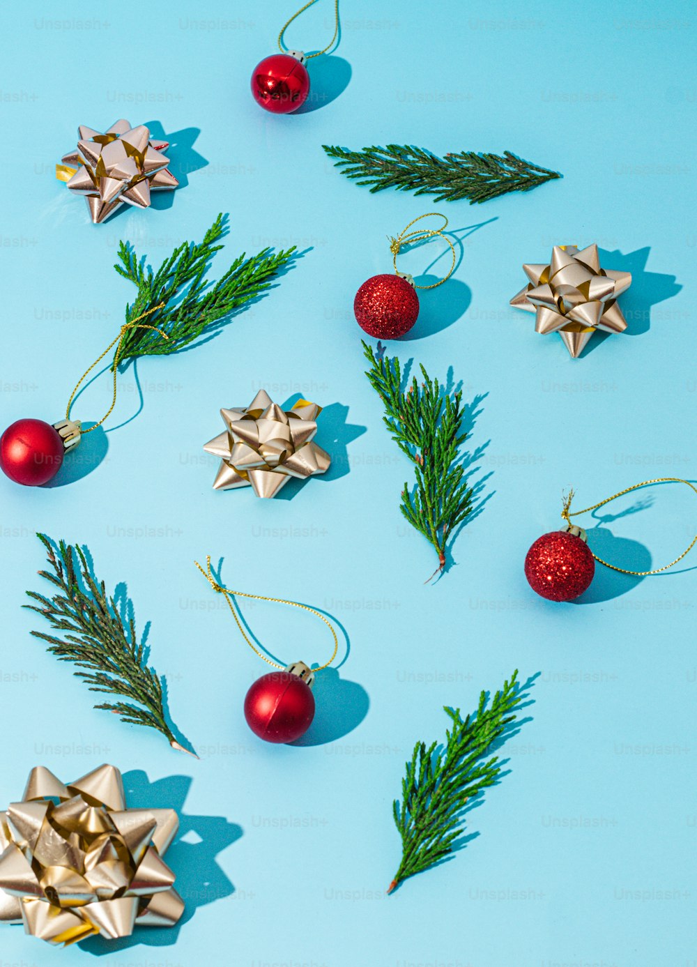a group of christmas ornaments on a blue background