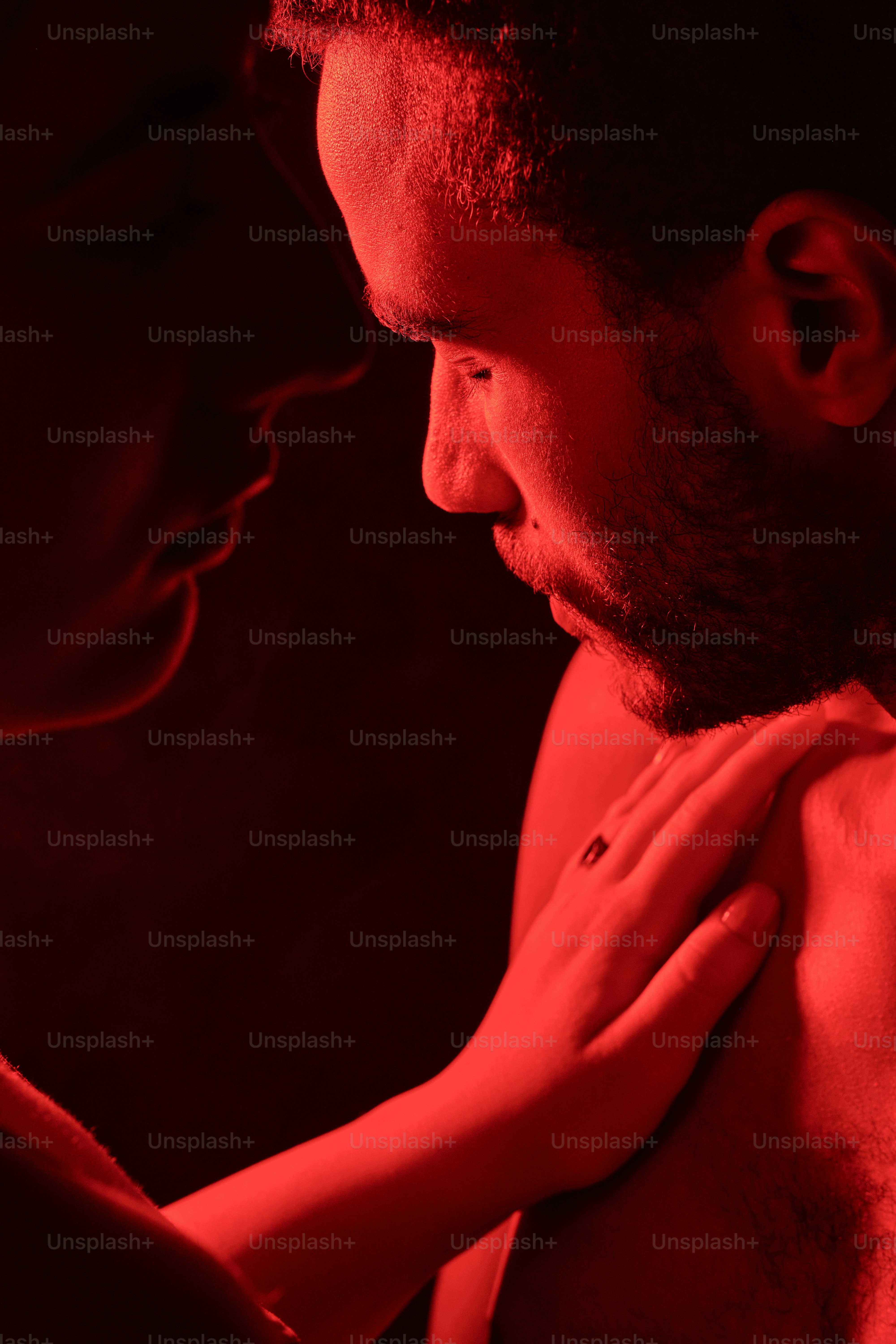 Couples captured in moments of intimacy reflecting their emotional connection.