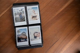 Cuatro fotos Polaroid de una mujer y un hombre sobre una mesa de madera