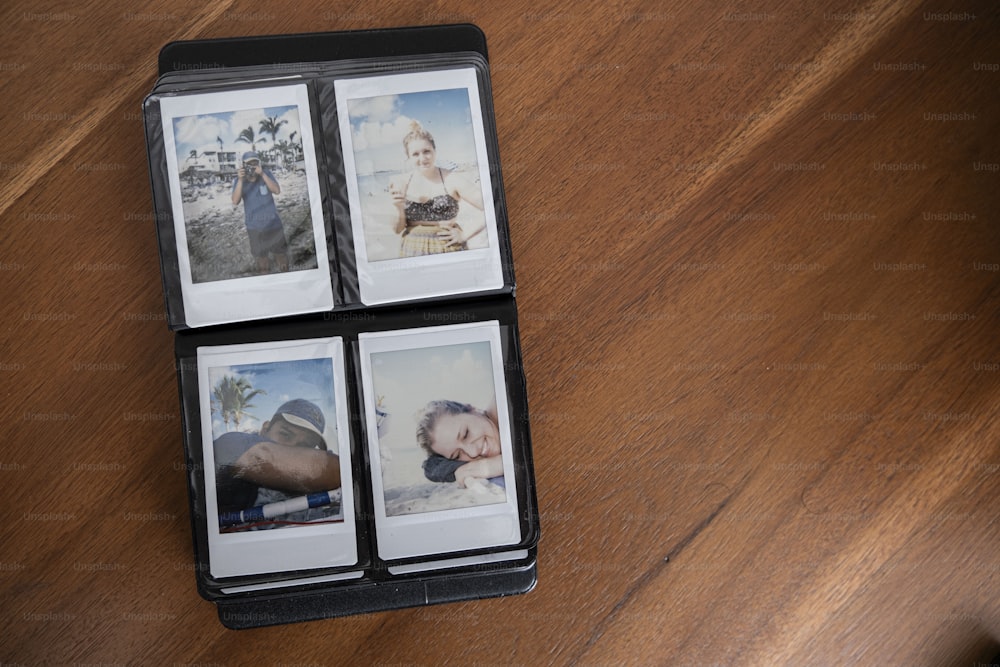 Cuatro fotos Polaroid de una mujer y un hombre sobre una mesa de madera
