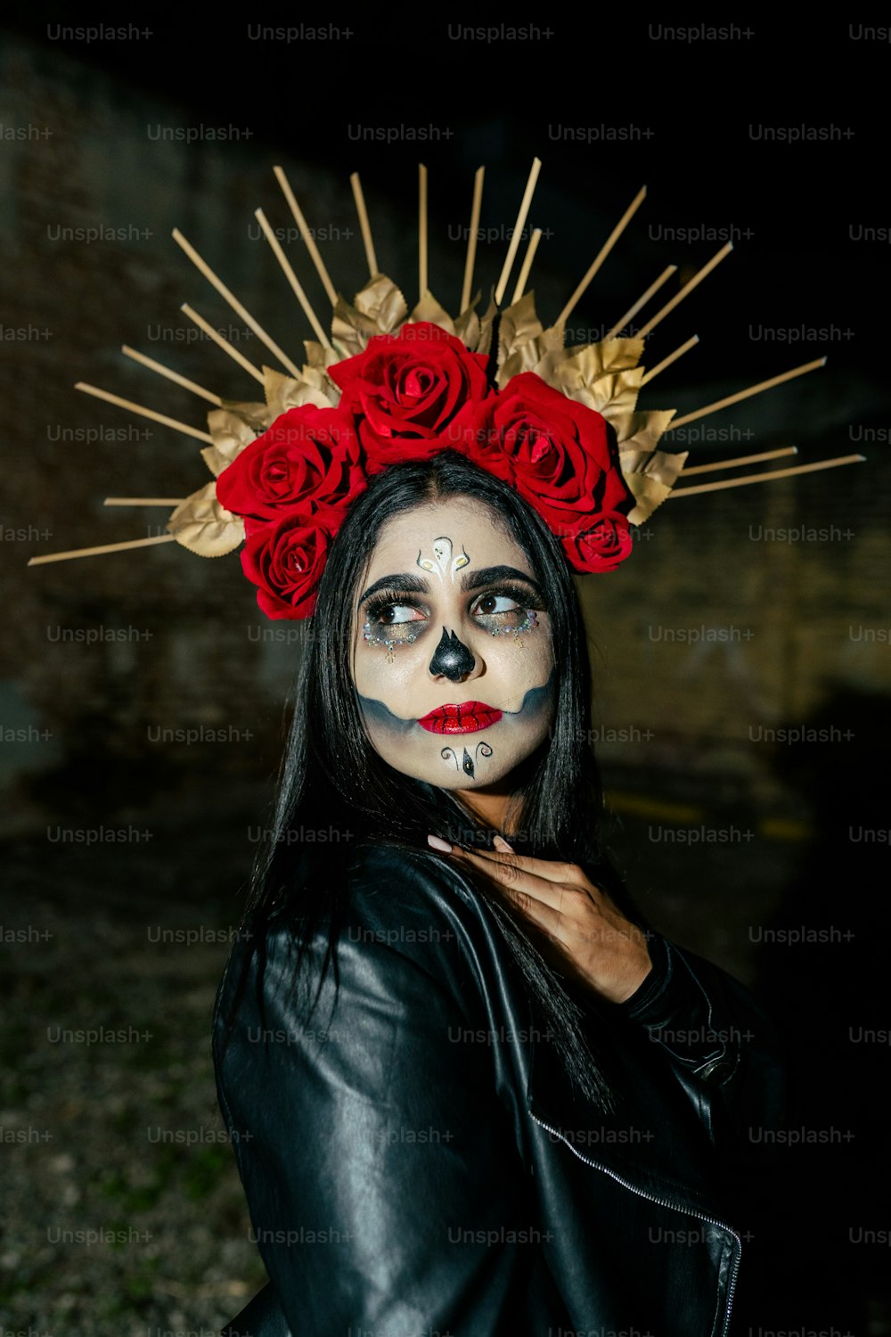 a woman with makeup and makeup art on her face