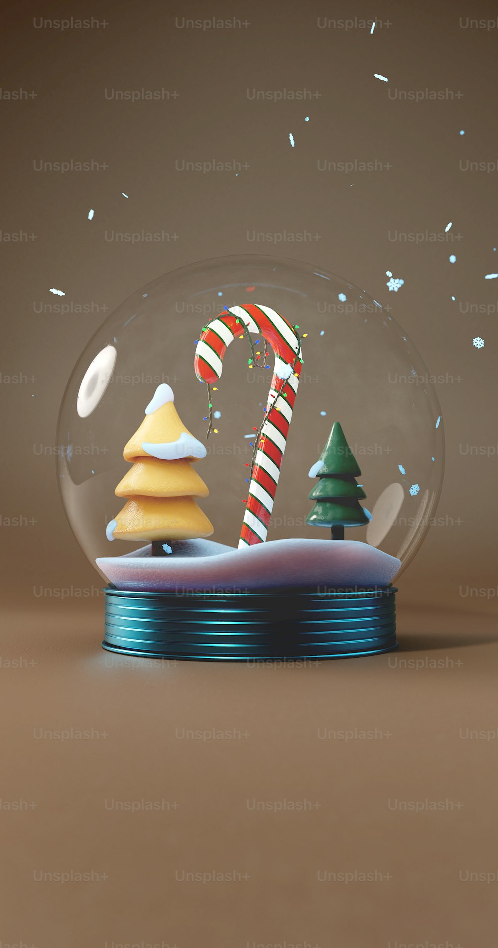 a snow globe with a candy cane in it