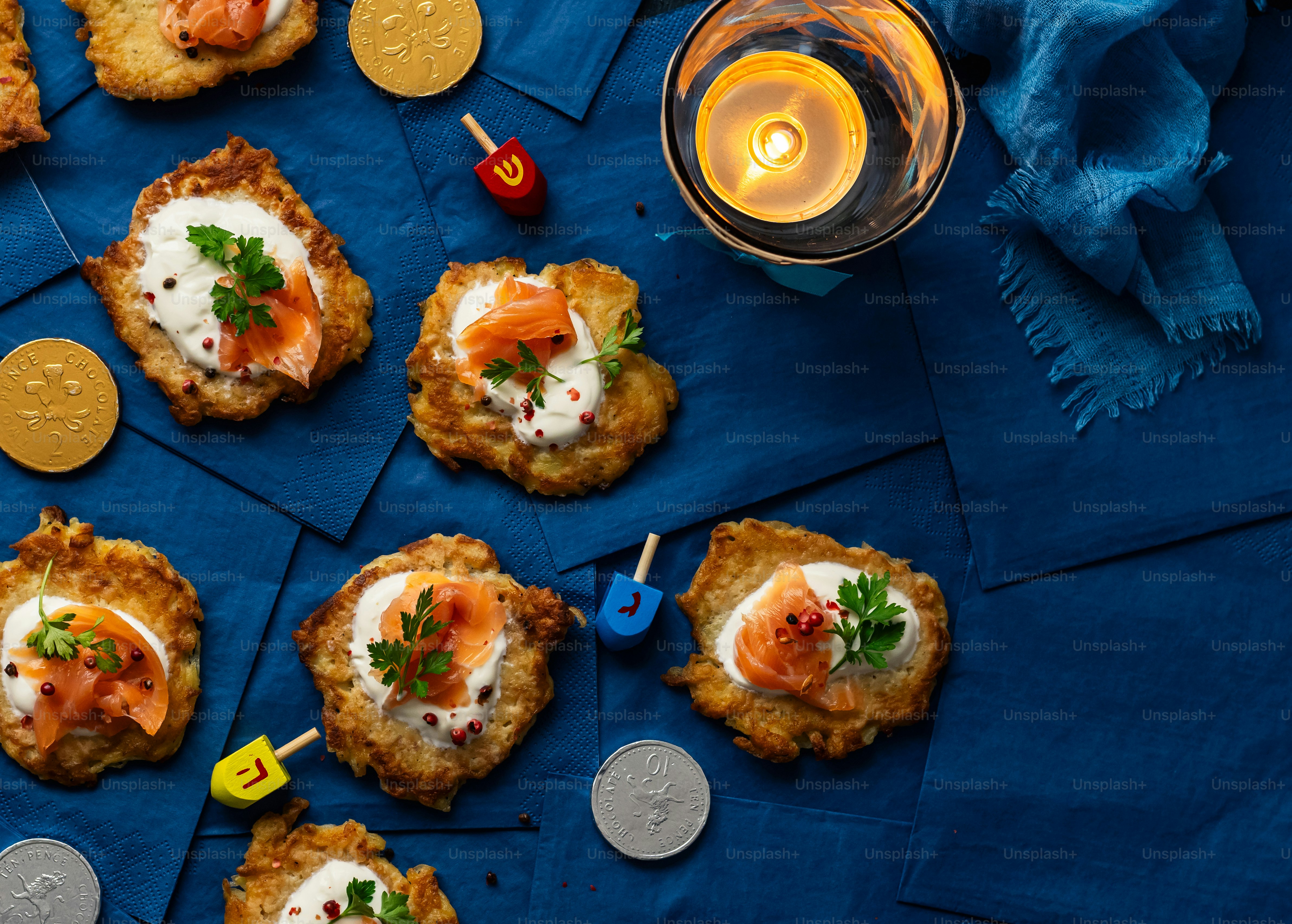 A table topped with cookies covered in toppings photo – Latkes Image on ...