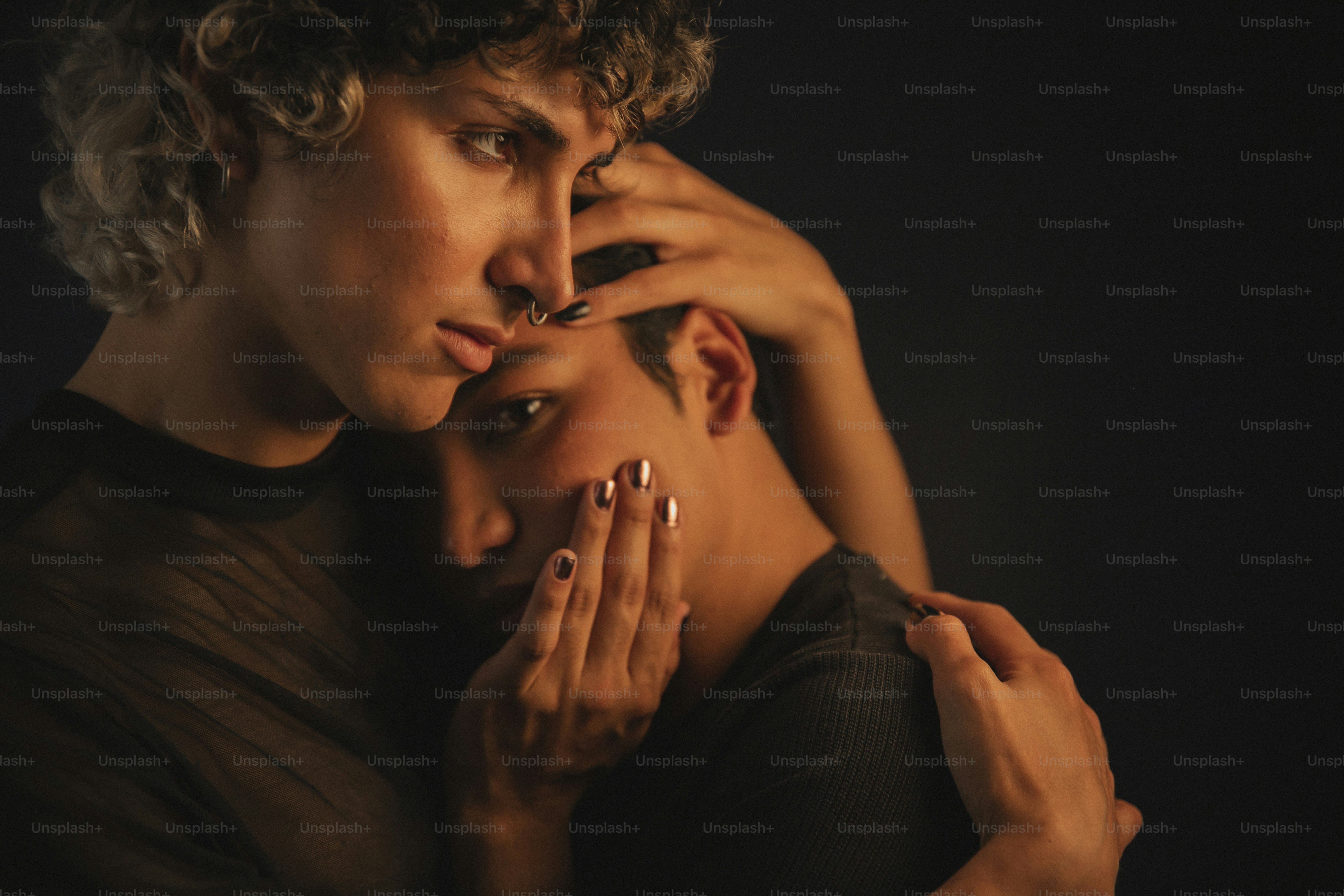 a couple of people that are hugging each other