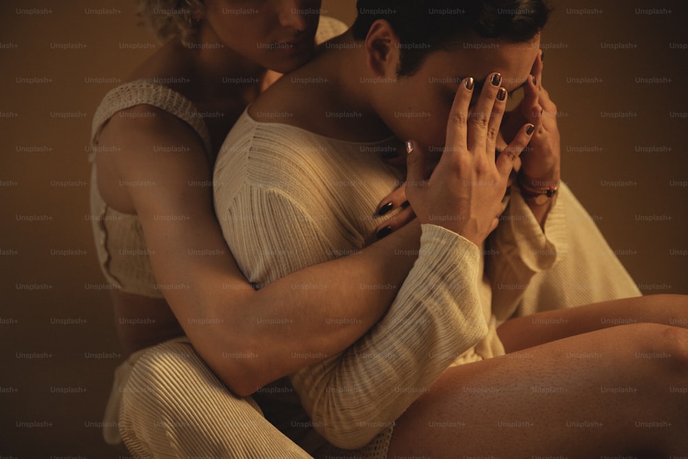 a man and a woman sitting next to each other