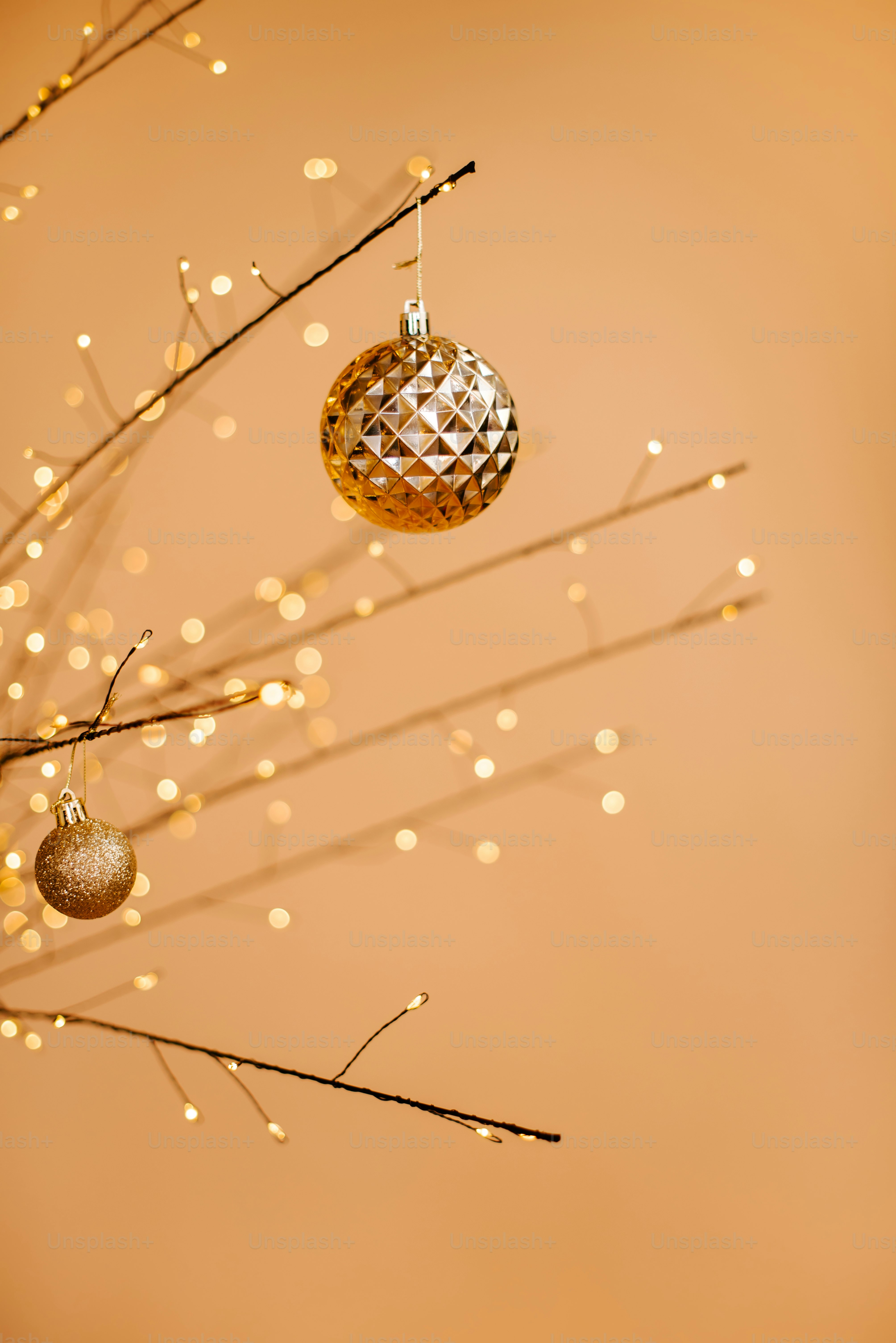 a couple of ornaments hanging from a tree