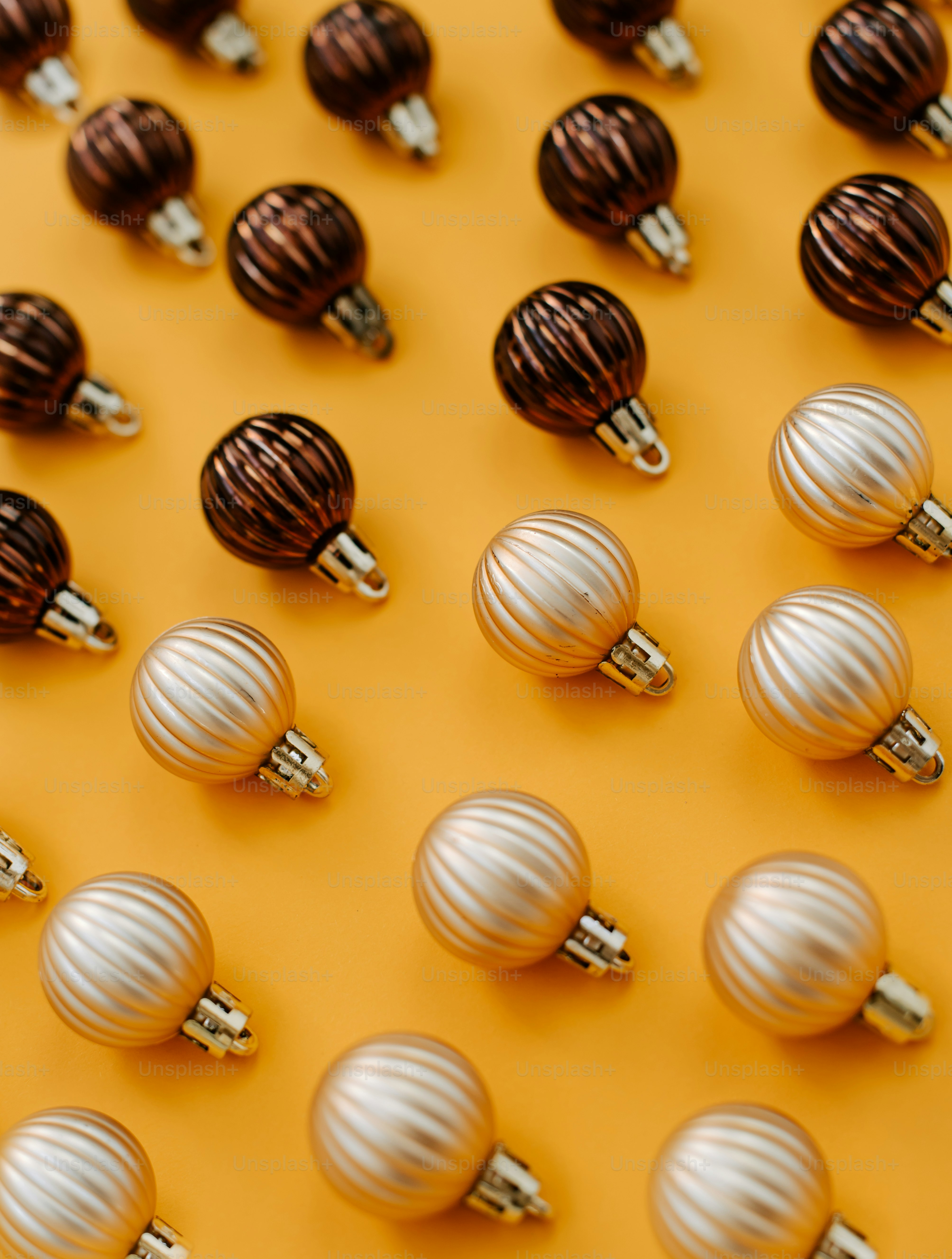 a table topped with lots of brown and white ornaments