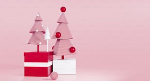 Un albero di Natale rosso e bianco seduto in cima a una scatola