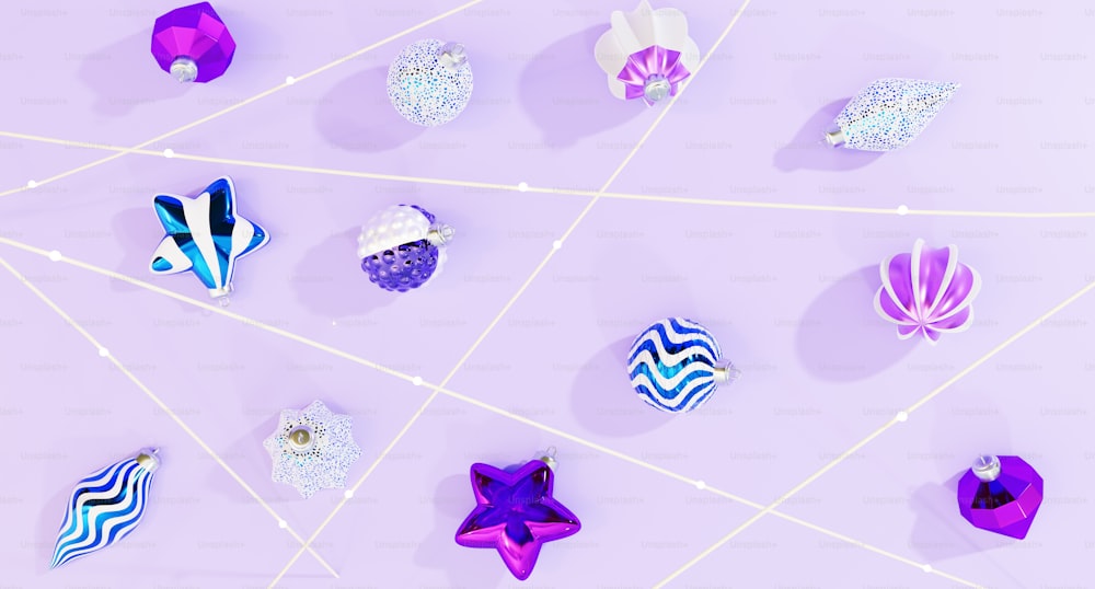 a group of different colored ornaments on a purple background