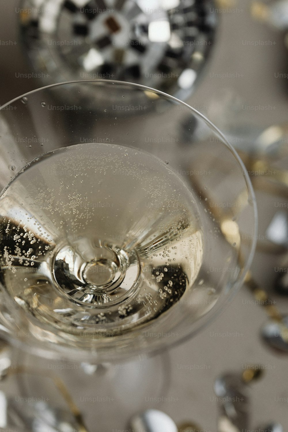 a close up of a wine glass on a table