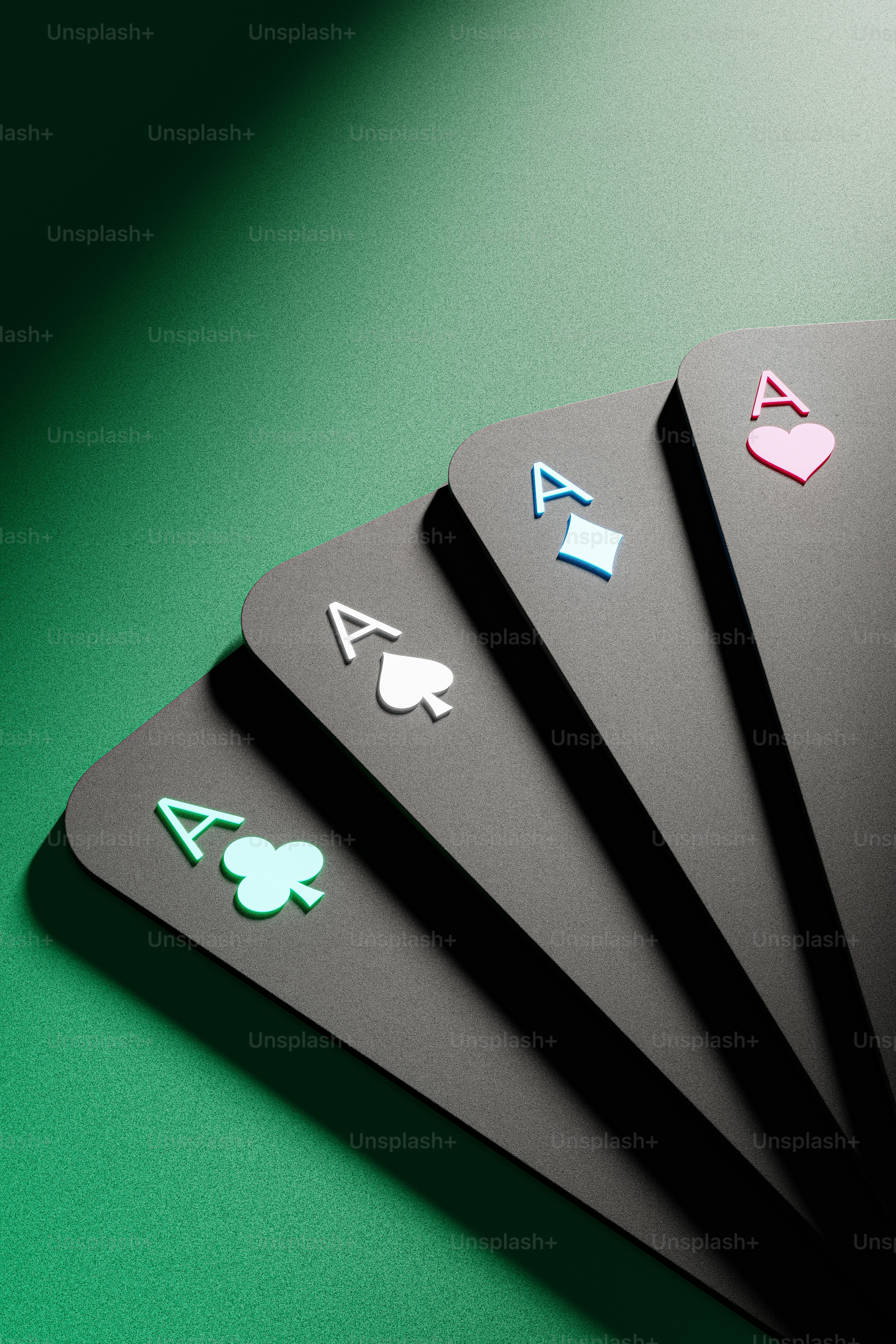 3D render of playing cards with different suits.