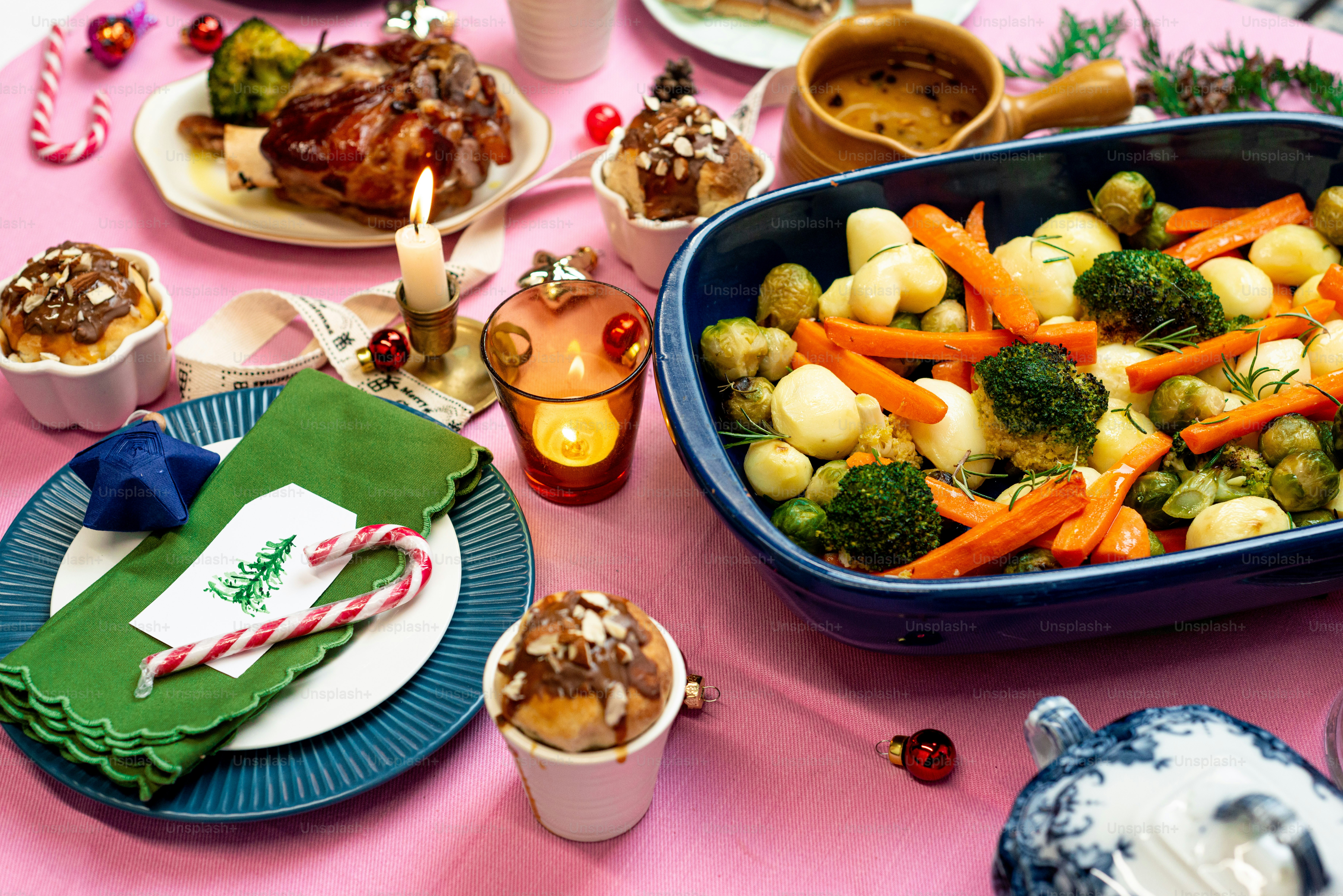 a table topped with plates and bowls of food