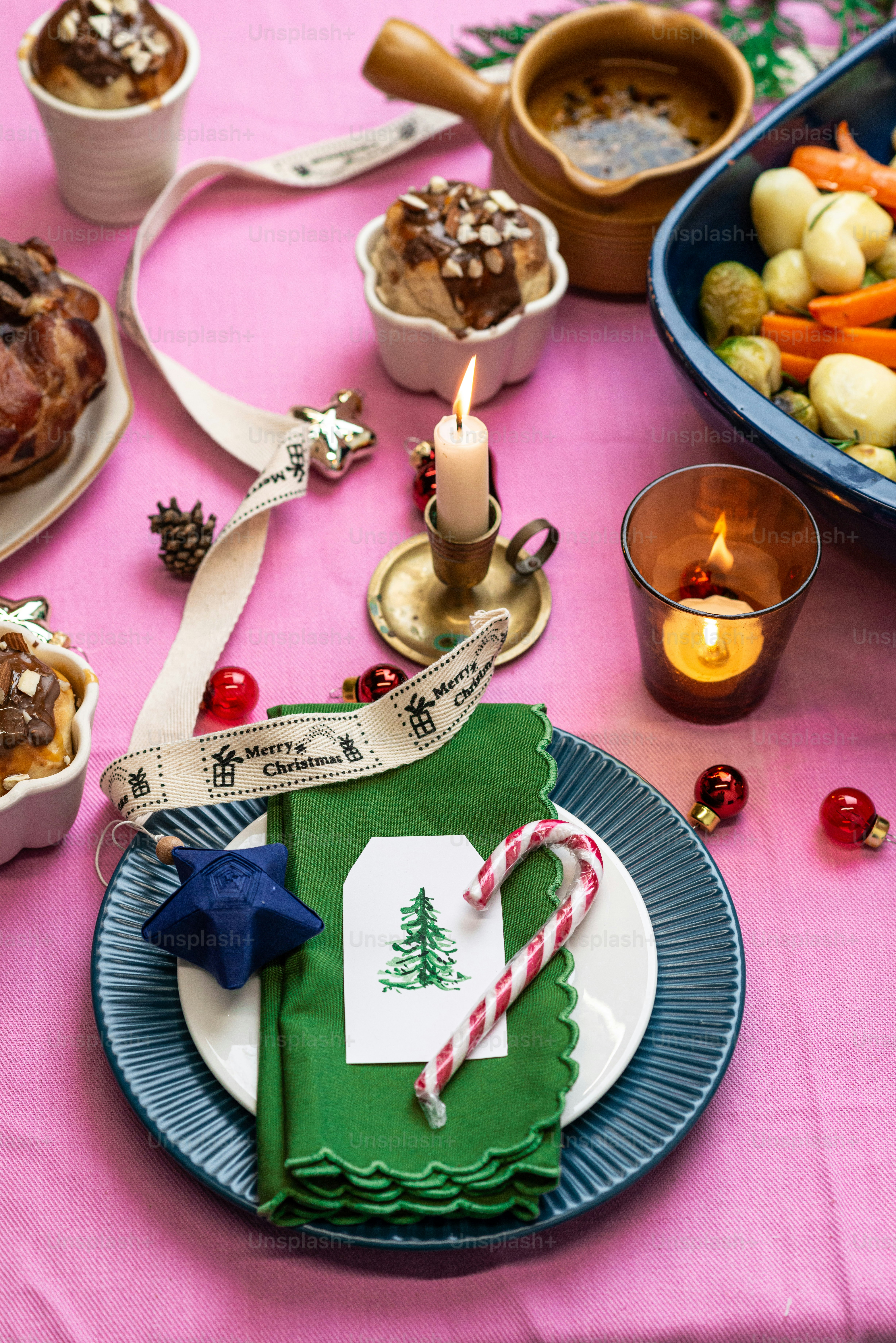 a table topped with plates and bowls of food