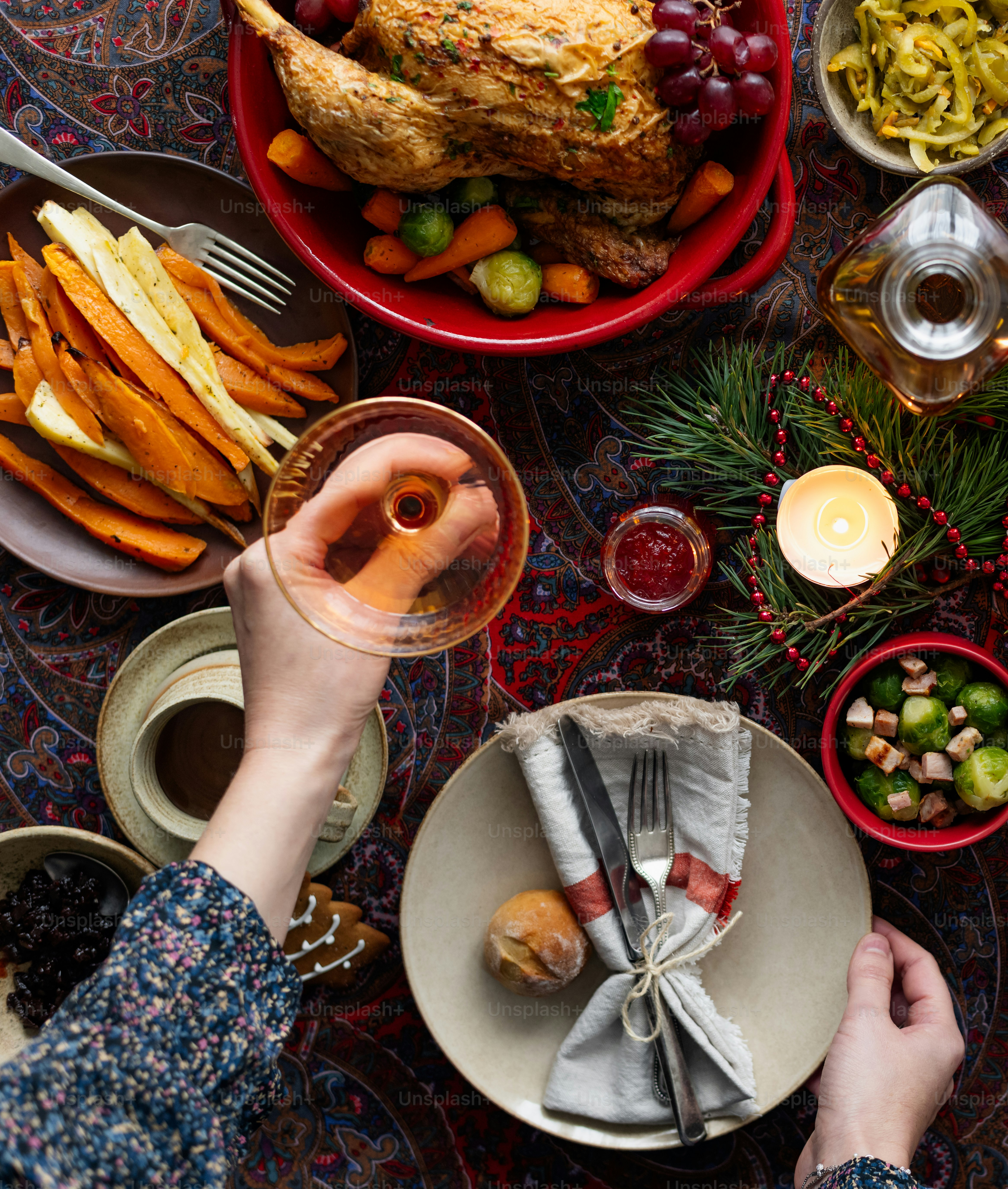 a table topped with plates of food and a turkey