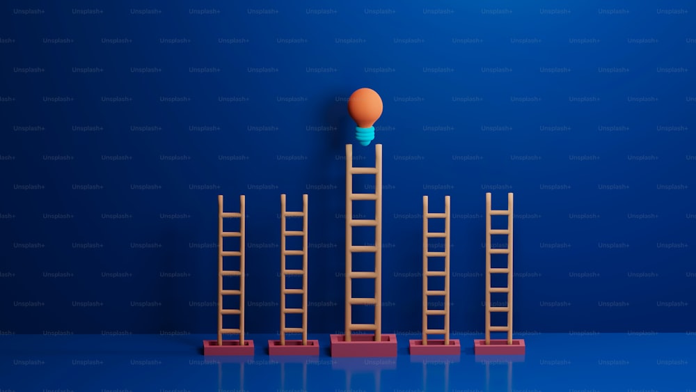 a ladder leading up to an orange ball on top of a ladder