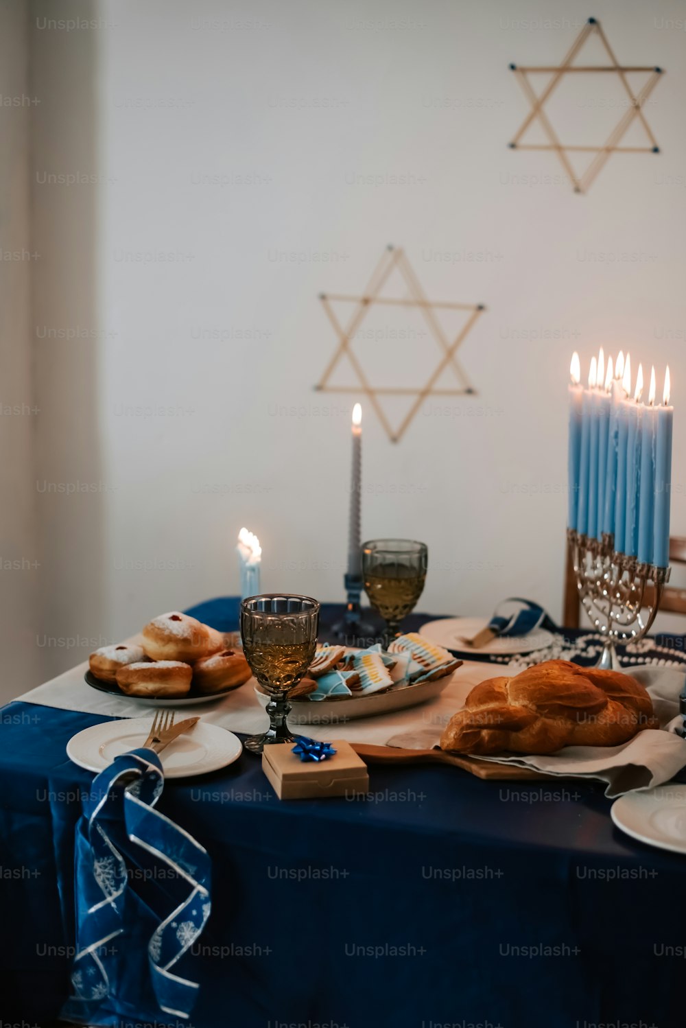 a table is set with bread and candles