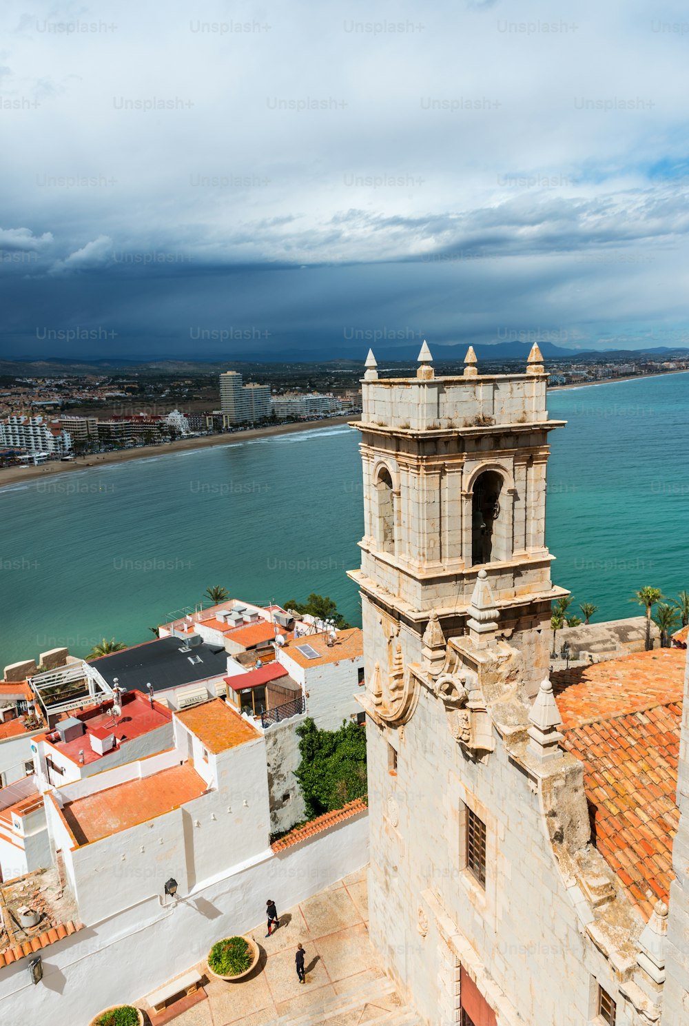 Aerial view of the fortified city and port of Peniscola (Peñíscola) in the Costa del Azahar in Castellón on a rainy day, Valencian Community in Spain.