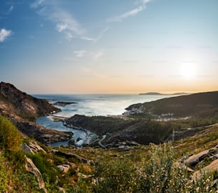 Aerial view of the Ria de Corcubion and Finisterre’s Cape from the top of Mount Pindo at dusk.