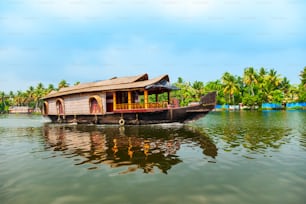 A houseboat sailing in Alappuzha backwaters in Kerala state in India