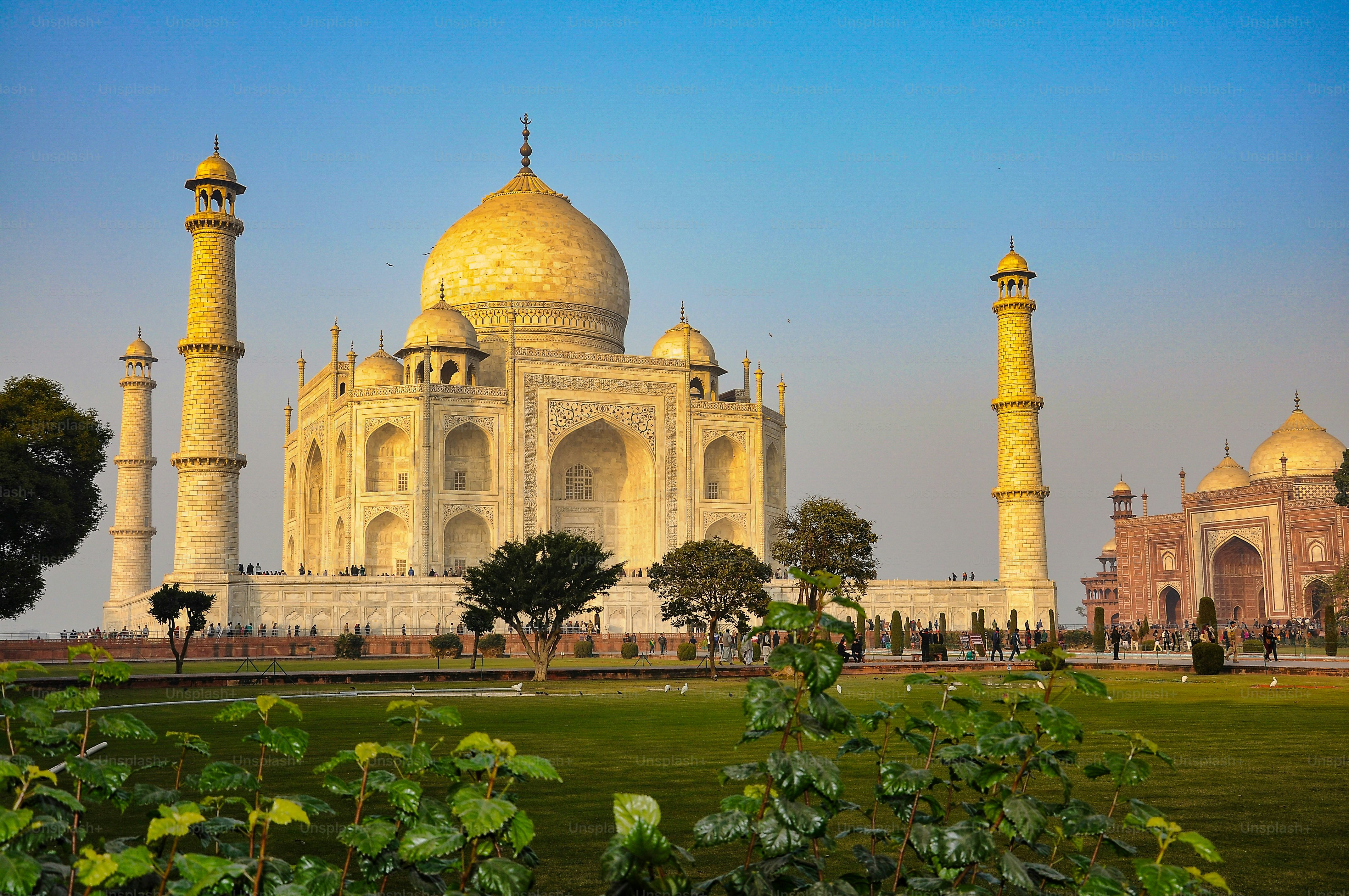 Taj Mahal is a white marble mausoleum on the bank of the Yamuna river in Agra city, Uttar Pradesh state, India