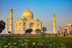 Taj Mahal is a white marble mausoleum on the bank of the Yamuna river in Agra city, Uttar Pradesh state, India