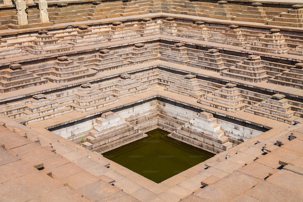 A stepped square water tank at Hampi, the centre of the Hindu Vijayanagara Empire in Karnataka state in India