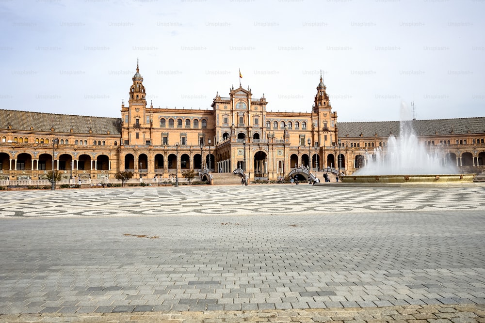 Famous Plaza de Espana. Spanish square in the centre of old but magnificent Seville, Spain. Unique moorish architecture. Built in 1929, is a huge half circle with a total area of 50,000 square meters