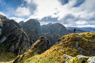 Misty weather and a young girl on top of Mount Aiako Harria, Guipuzcoa. Basque Country