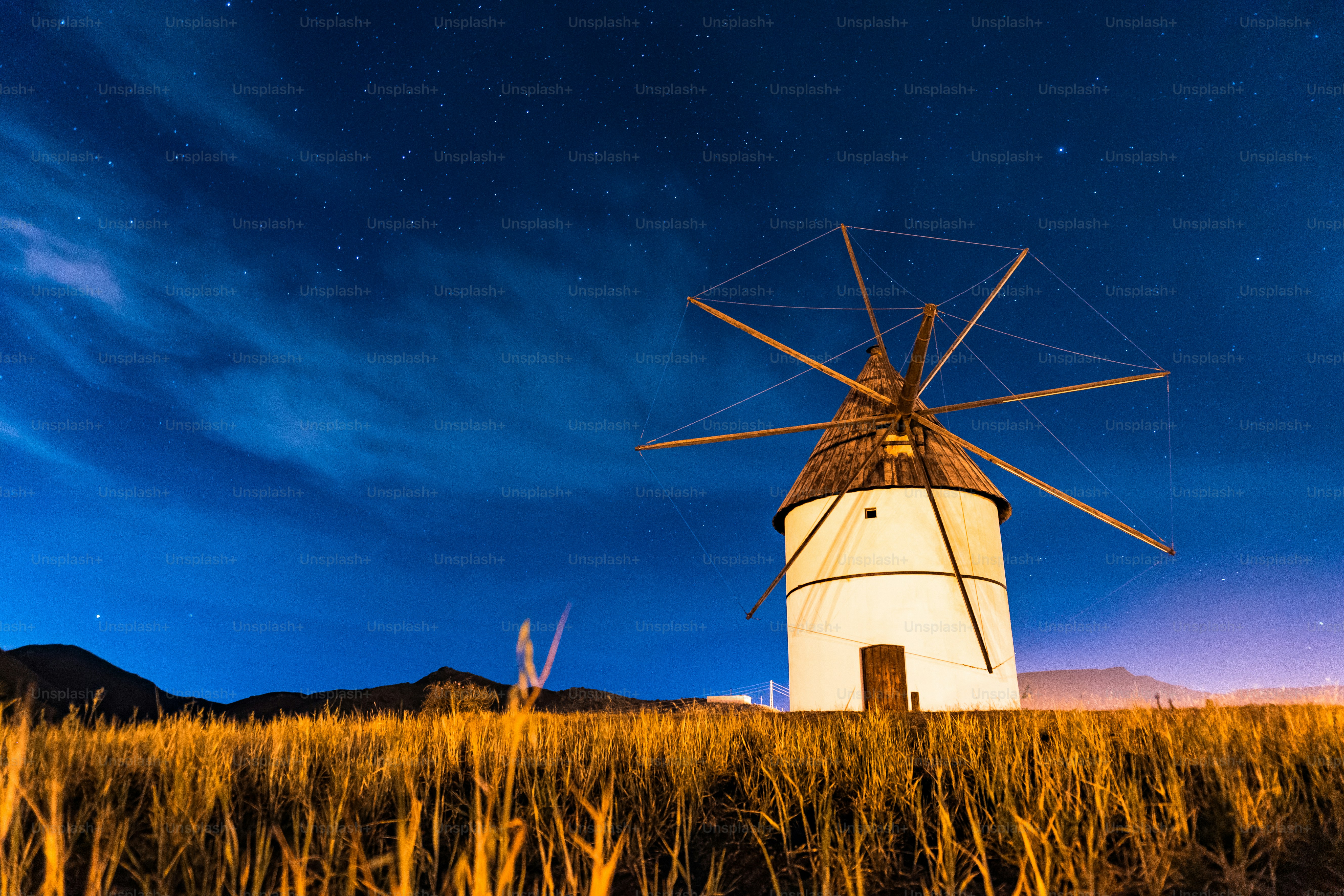 Molino del Pozo de los Frailes at night in the town of San Jose in Cabo de Gata, Almería. Mediterranean sea, spain