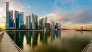 Singapore financial district skyline at Marina bay on sun set time, Singapore city, South east asia.