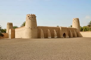 The fortress of Al Jahili Fort under blue sky in Al Ain, United Arab Emirates