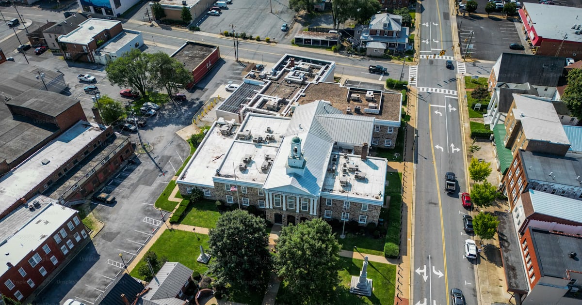An aerial view of a cityscape Warren County District Court Front An aerial view of a cityscape Warren County District Court Front