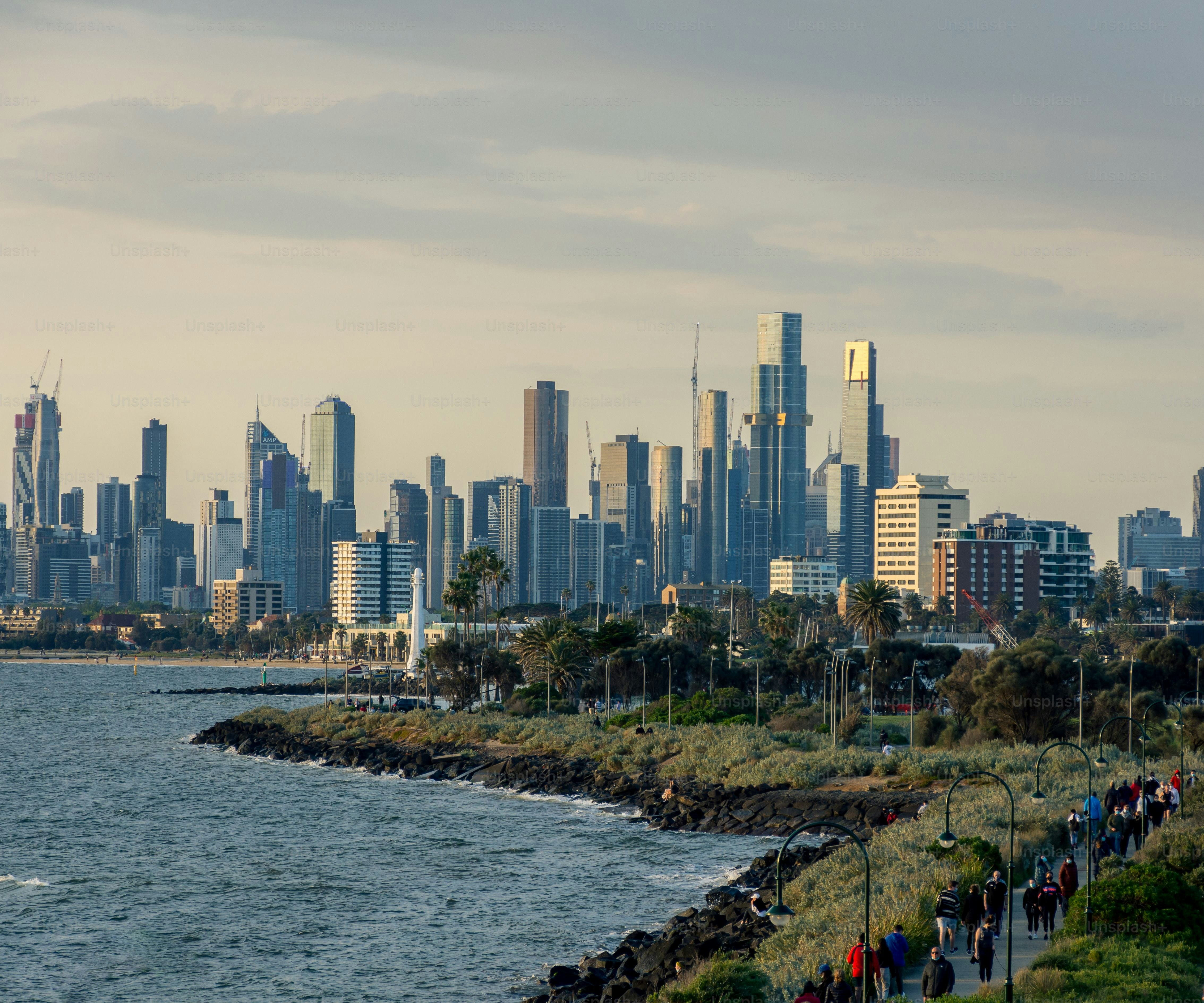 The skyline of Melbourne across water on a summer day, Australia