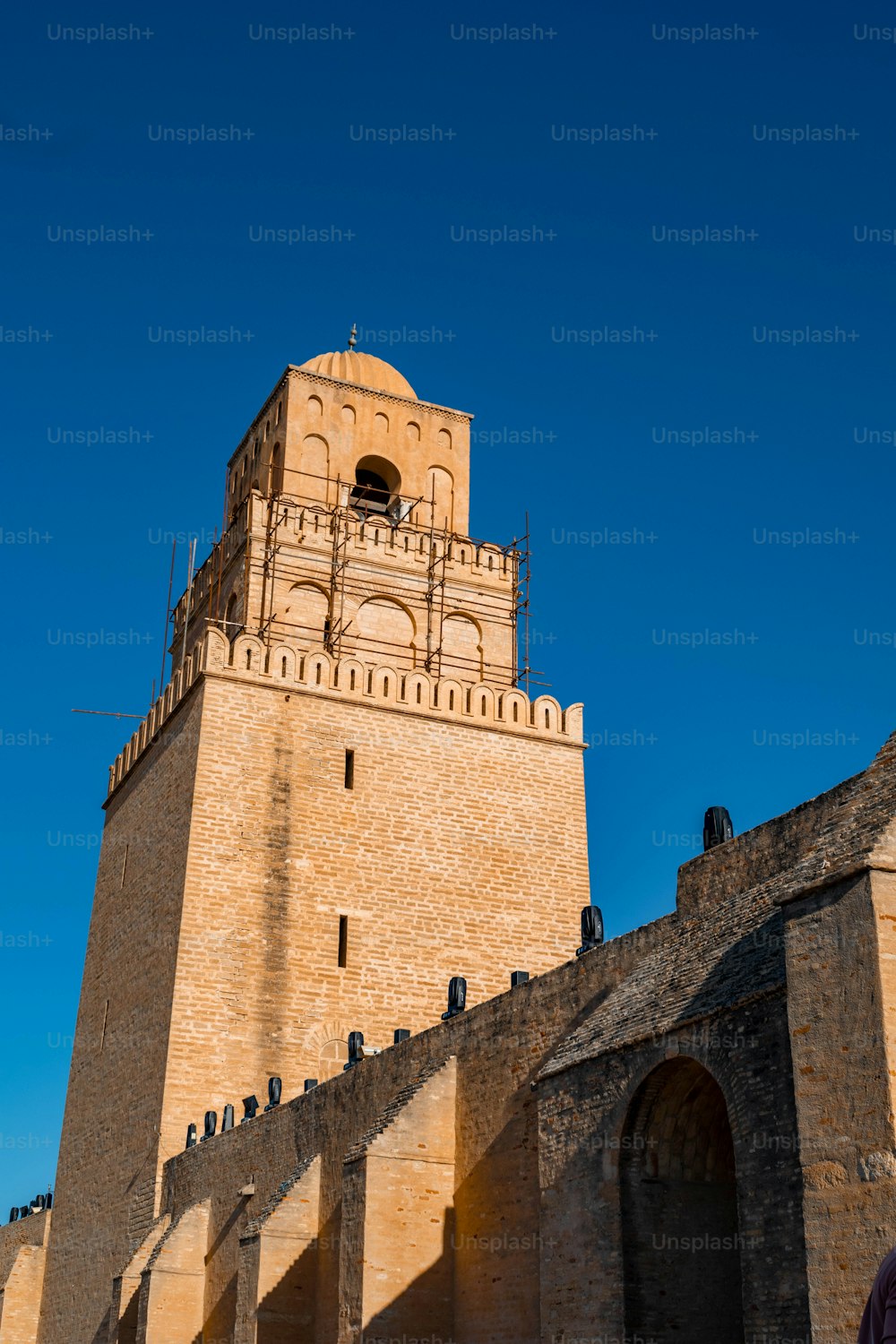A low angle shot of the Great Mosque of Kairouan in Tunisia