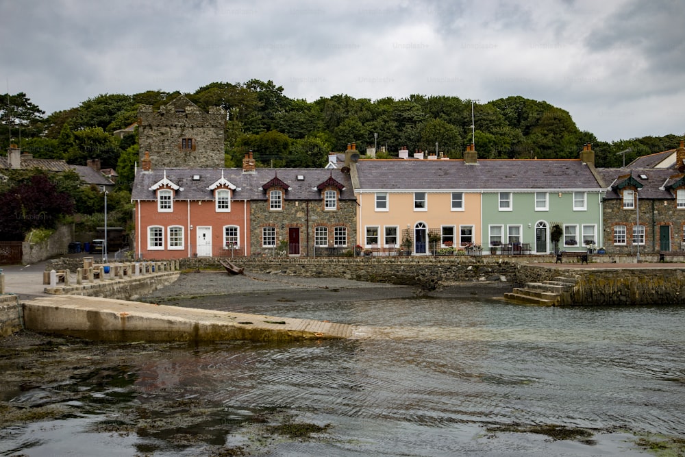 A beautiful scene of colorful houses on the shore of the sea of Strangford in Northern Ireland